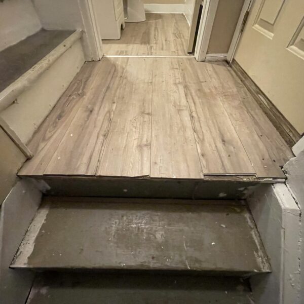 Image of steps to bathroom door