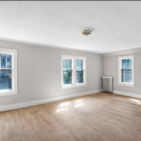 Living room with three windows on walls