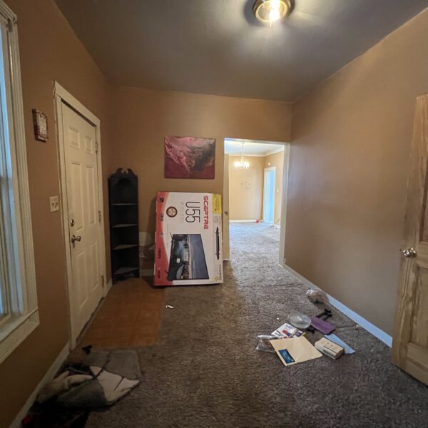 Image of Hallway and doors with tv box