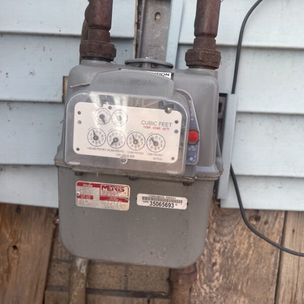 closeup view of a meter outside a house