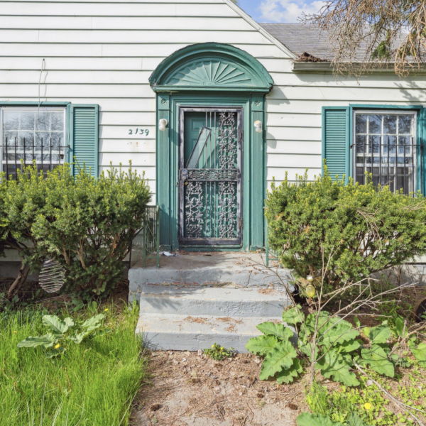 front view of a house with a green door
